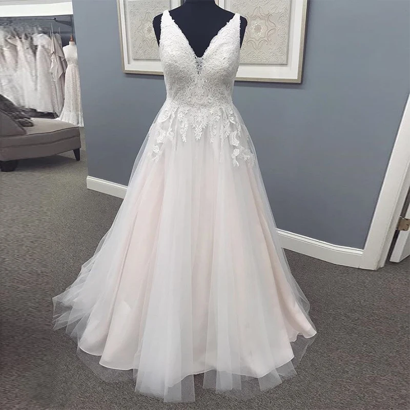 

Real Photos V-neck Wedding Dresses Sleeveless Appliques White Ivory Bridal Gowns Backless Chapel Train Vestido De Casamento 2019