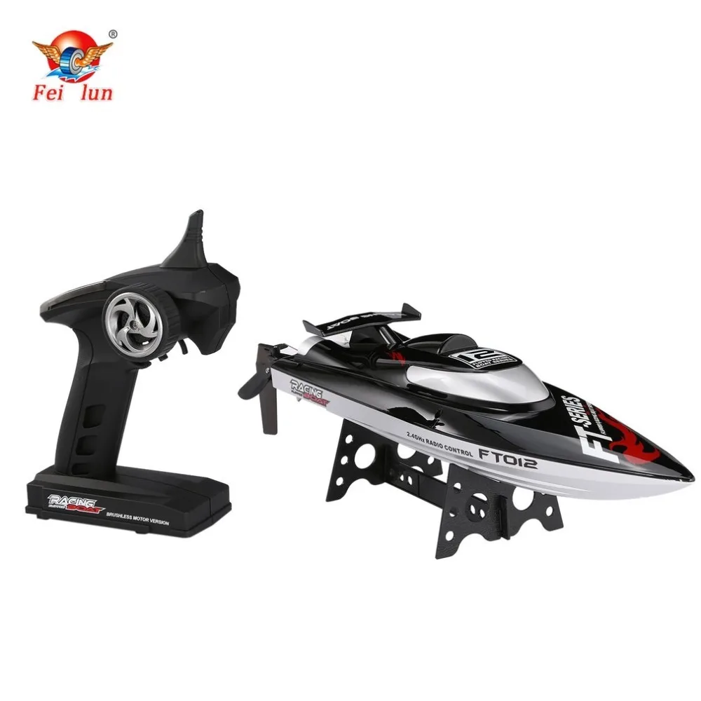 Feilun FT012 2.4G RC قارب 45 km/h قارب سباق عالي السرعة سريع السفينة مع فرش السيارات نظام مياه التبريد انقلبت RTR