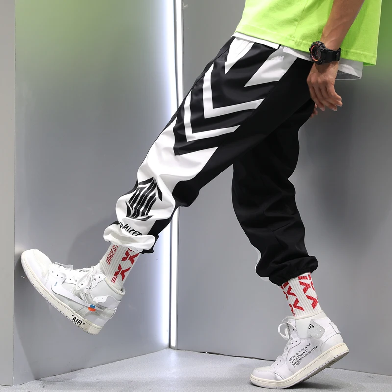 Men's sports pants summer thin section personality hip hop trend loose beam feet nine pants students couples trend pants Men's sports pants summer thin section personality hip hop trend loose beam feet nine pants students couples trend pants