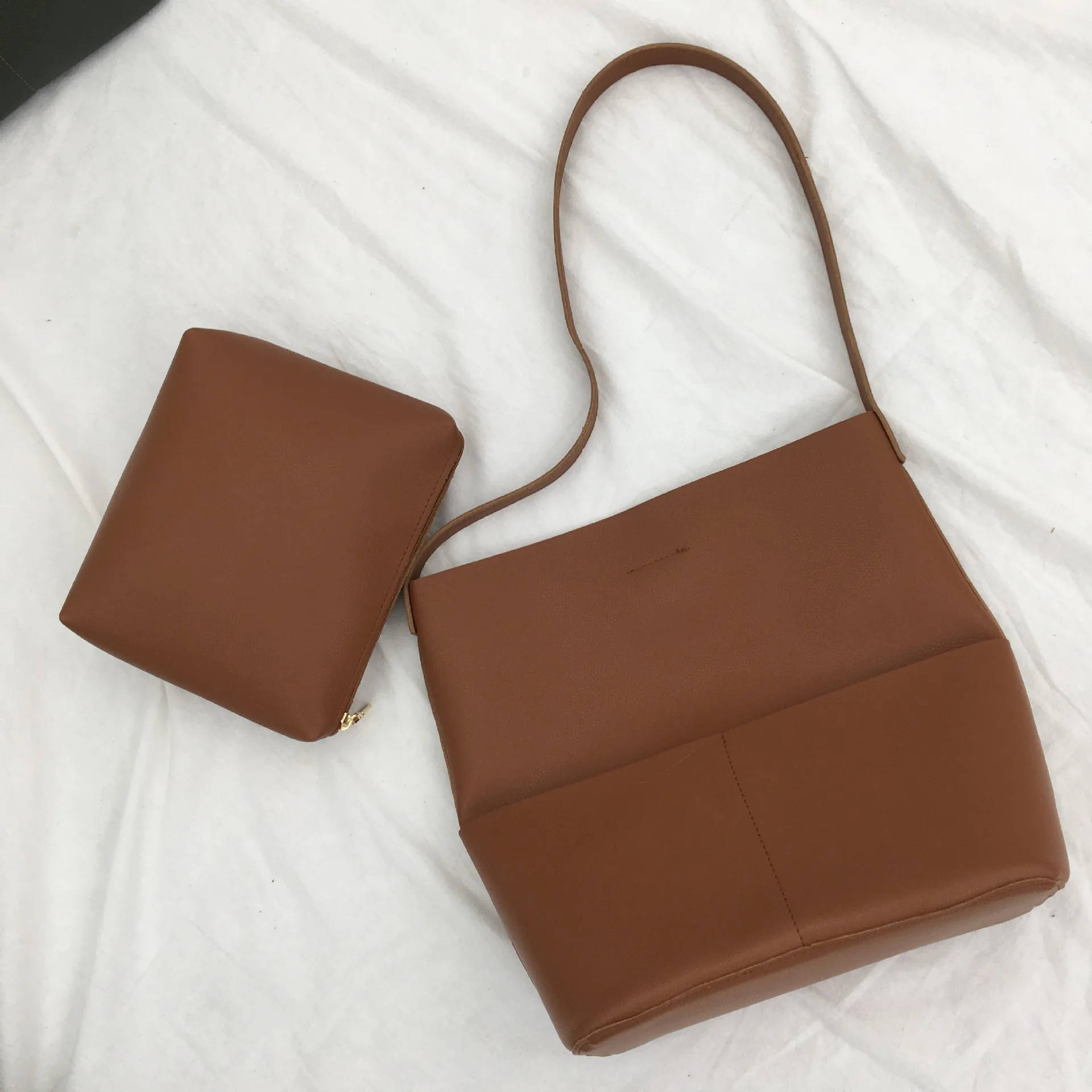 

The new simple retro pu leather large capacity bag single shoulder oblique cross bucket bag 100 take leisure women's bag