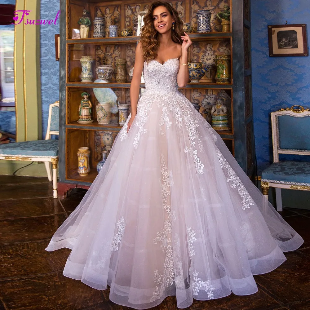 

Fsuzwel New Arrival Elegant Strapless Lace Up A-Line Wedding Dresses 2019 Luxury Beaded Appliques Bohemian Bridal Gown Plus Size