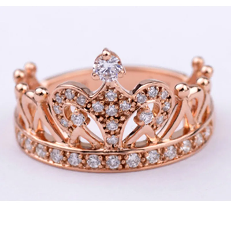 Ladies rose gold crown rings with pink diamonds