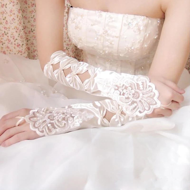 Горячая Распродажа Высокое качество белые цвета слоновой кости свадебные перчатки без пальцев дешевые прозрачные кружевные Украшенные бусинами Свадебные перчатки Luva De Noiva для женщин