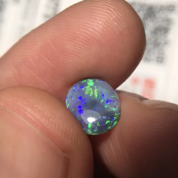 

Black Opal 1.195 carat Natural Opal Australia Lightning Ridge Origin Oval Cut Loose Gemstones Loose Stones Loose Gems