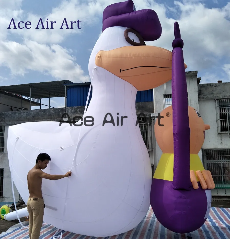 

5 m H continuous blowing inflatable crane with a baby for gender reveal party"it's a boy