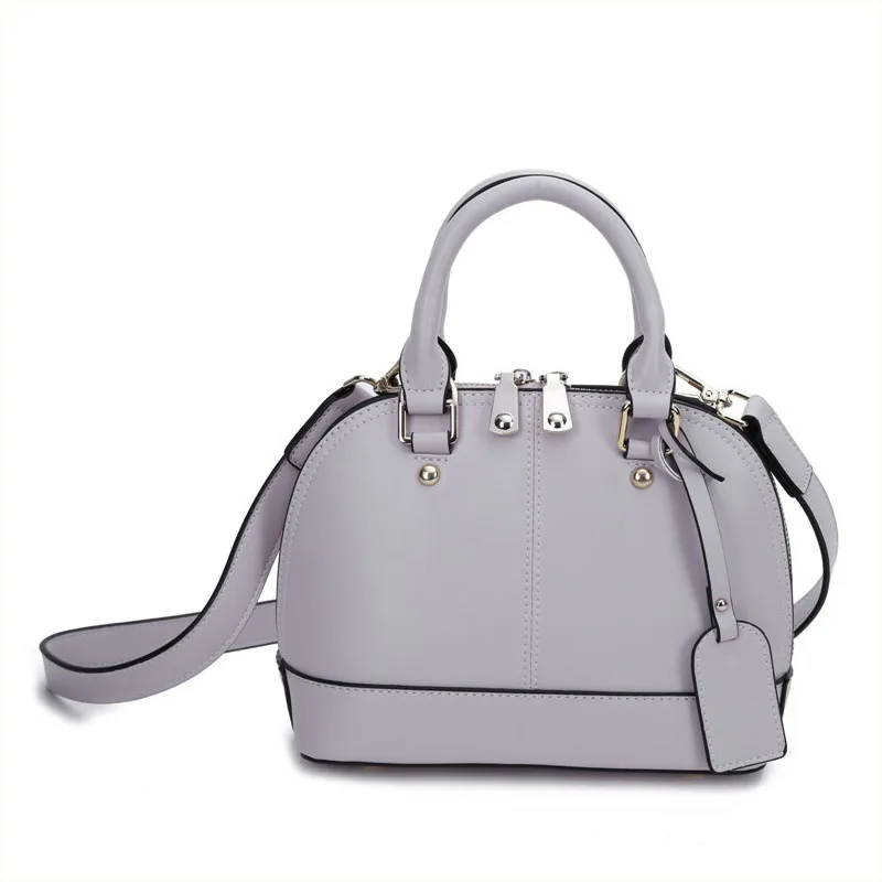 

Ms. Europe and the United States fashion shell-type leather shoulder bag New-skin leather the color shell zipper handbag