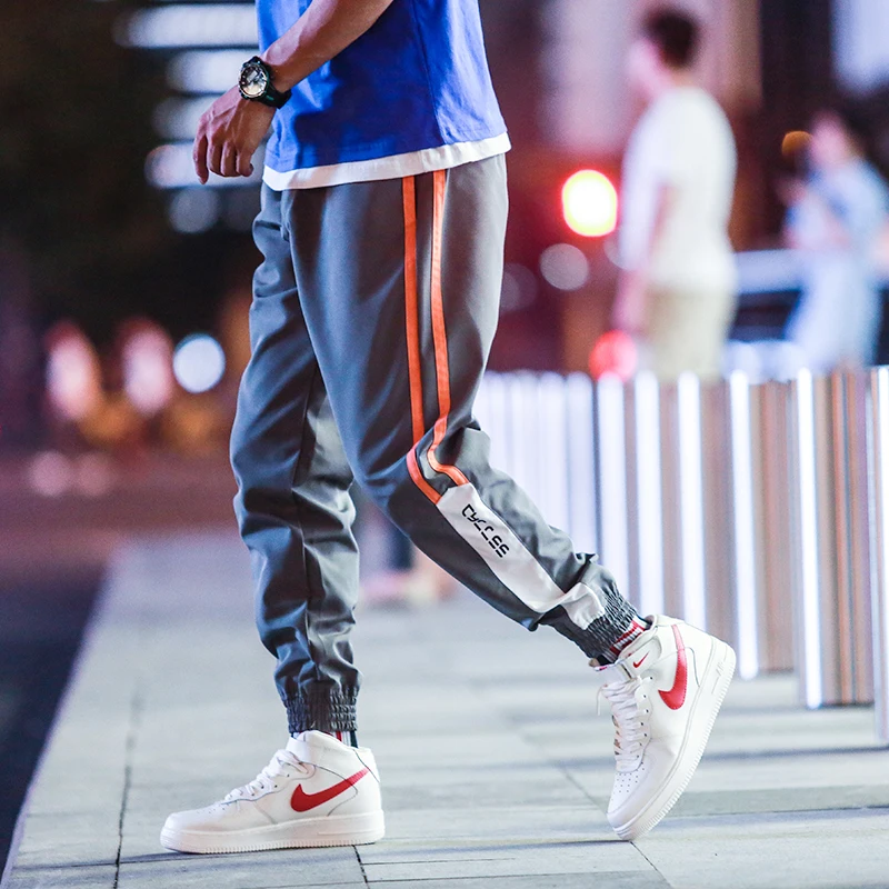 

New 2018 autumn fashion striped patchwork harem pants men elastic waist ankle banded pants streetwear jogger pants men XXK21