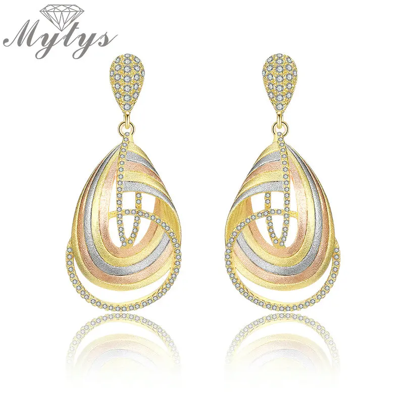 Buy Mytys Geometry Cross Three Tone Gold Earrings for