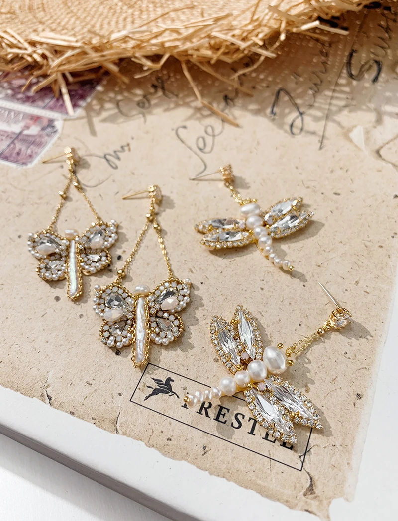

Pure handmade chic bright natural freshwater Pearl dragonfly butterfly shape earnail earrings female