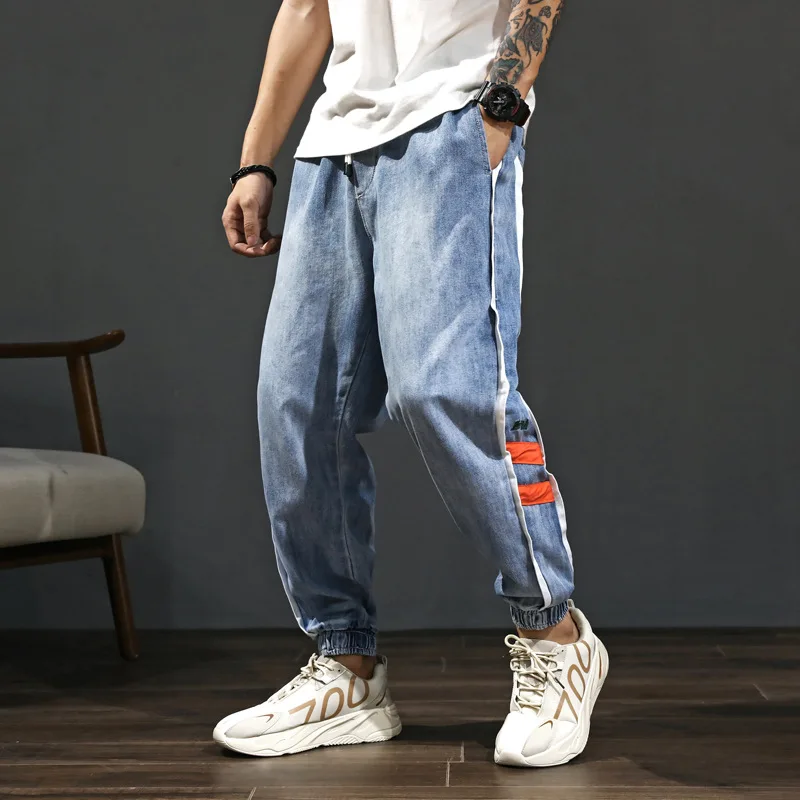 Fashion Streetwear Men Jeans Blue Color Loose Fit Side Stripe Spliced Harem Jeans Men Cargo Pants Slack Bottom Hip Hop Joggers Fashion Streetwear Men Jeans Blue Color Loose Fit Side Stripe Spliced Harem Jeans Men Cargo Pants Slack Bottom Hip Hop Joggers
