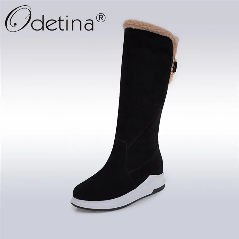 Женские сапоги на плоской платформе Odetina теплые зимние до середины икры с пряжкой