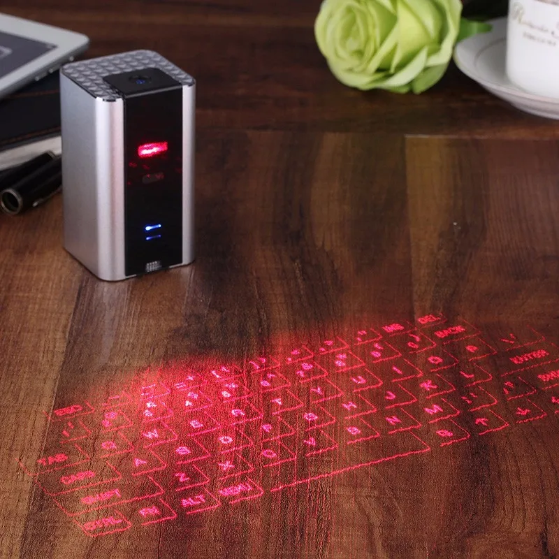 

KB630-X1 Multi Function Wireless Laser Bluetooth Projection Keyboard with Stereo Hands-free Calls Speaker Function For PC Phones