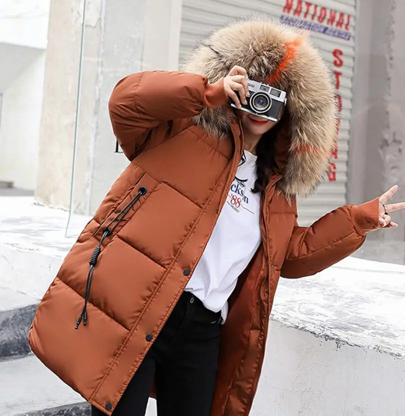 

Women's mid long Cotton clothing coat Fashion warm color big fur collar cotton coat Casual oblique pocket tassel parkas Thick