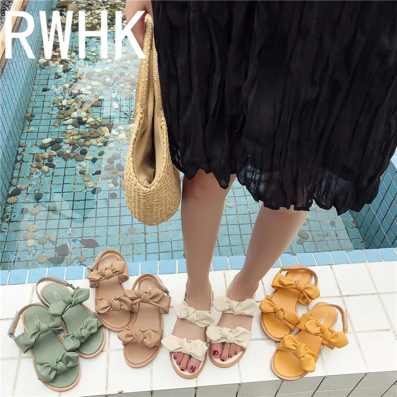 

RWHK Korean version of the word buckle flat sandals female summer 2019 new soft bottom retro wild bow soft bottom shoes B114
