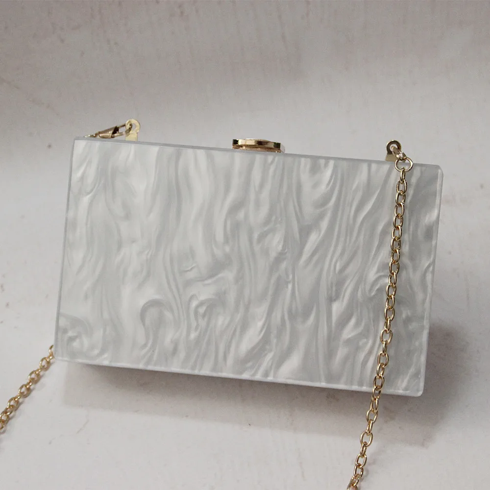white acrylic clutch