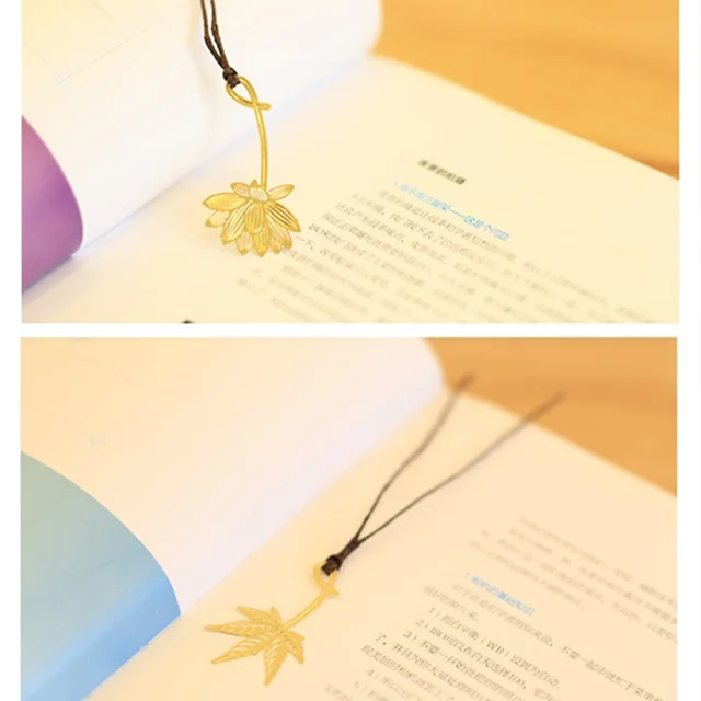 4pcs Clover Leaf Bookmark - A stylish and practical accessory for book lovers, made of gold-colored metal with a geometric design.