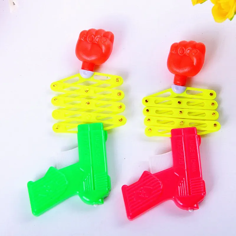 3pcs-set-Gags-Practical-Jokes-Funny-magic-elastic-telescopic-fist-gun-magic-tricks-toys-for-children