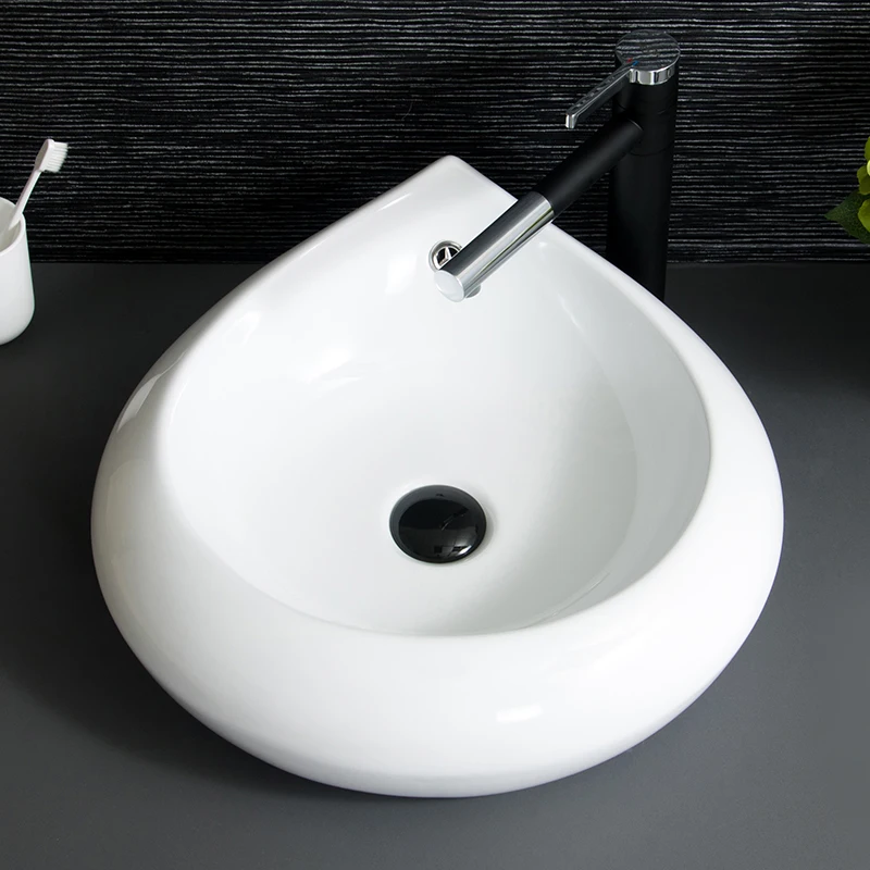 China Artistic Handmade Ceramic wash basin Lavobo Round Counter top ceramic art wash basin porcelain hand wash basin  (1)