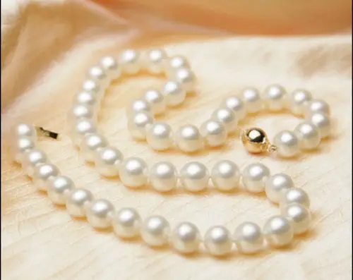 

Hot selling free shipping******* Beauty 10-11mm AAA+ White South Sea Round Pearl Necklace 18