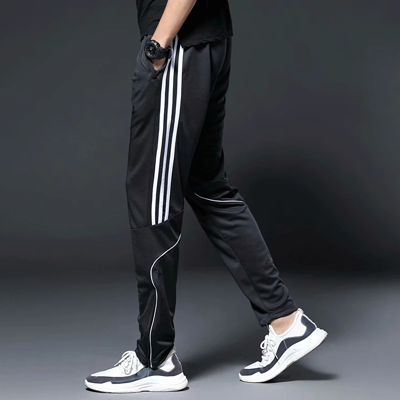 Tanie Męskie sportowe do biegania zamek do spodni kieszenie sportowe piłka nożna piłka nożna szkolenia spodnie sportowe elastyczność Legging jogging Gym spodnie