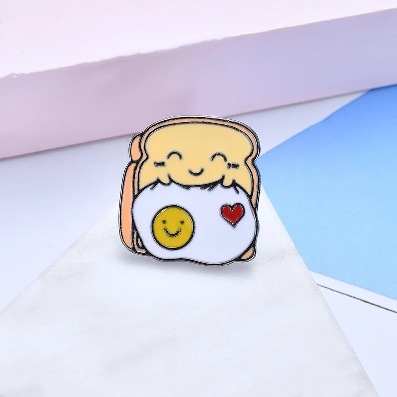 

Cute Cartoon Toast Bread Brooches for Women Smile Bread Cute Egg Jewelry Enamel Pin Denim Jackets Collar Badge Icon Button Gift