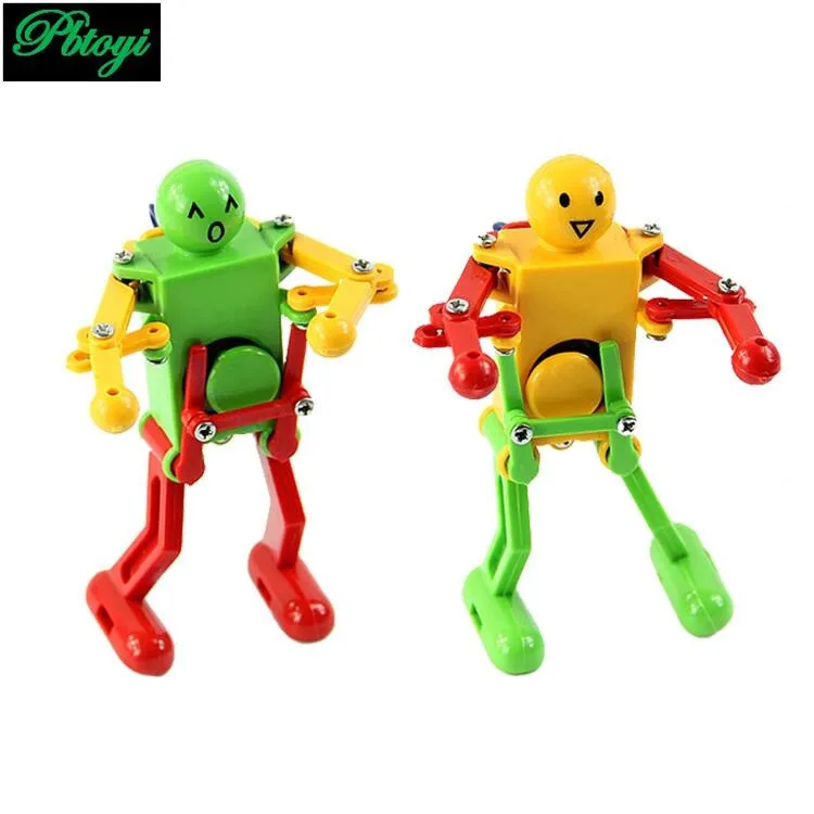 2PCS Clockwork Spring Wind Up Dancing Robot For Children Kids Toy Gift