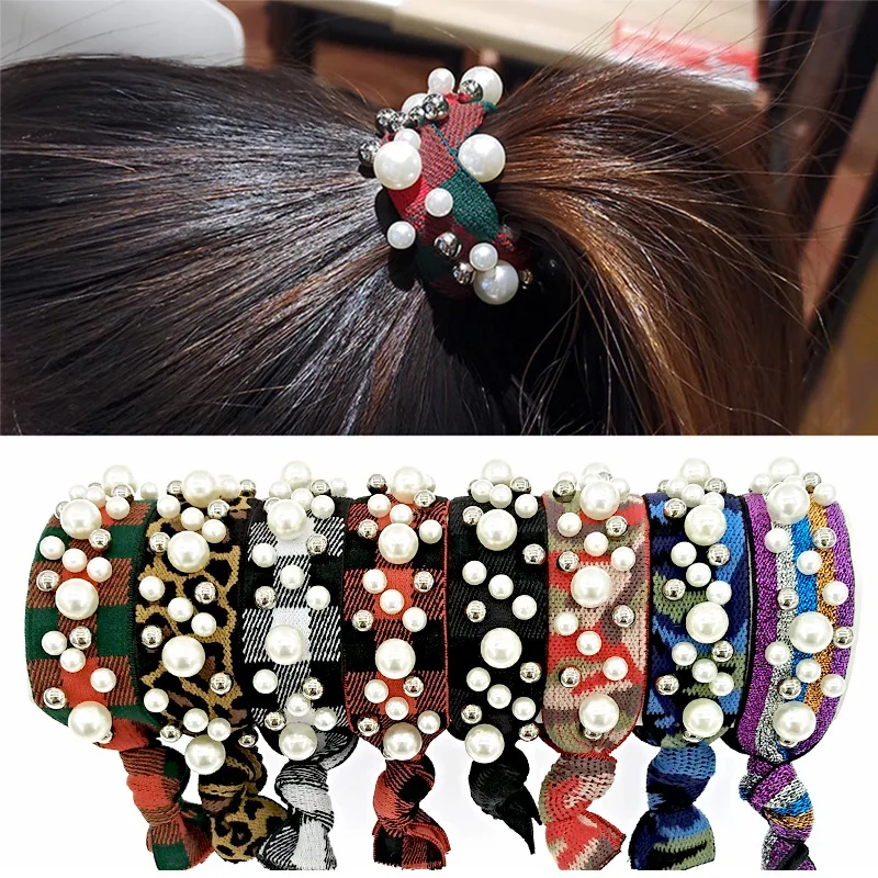 

Korean version of the pearl hair ring leopard bead knotted hair rope rainbow high elastic rubber band ball head rope female