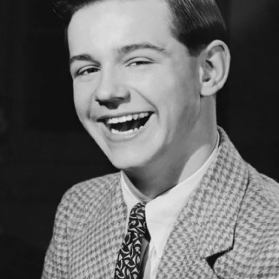 Portrait of a teenage boy laughing Poster Print (18 x 24)