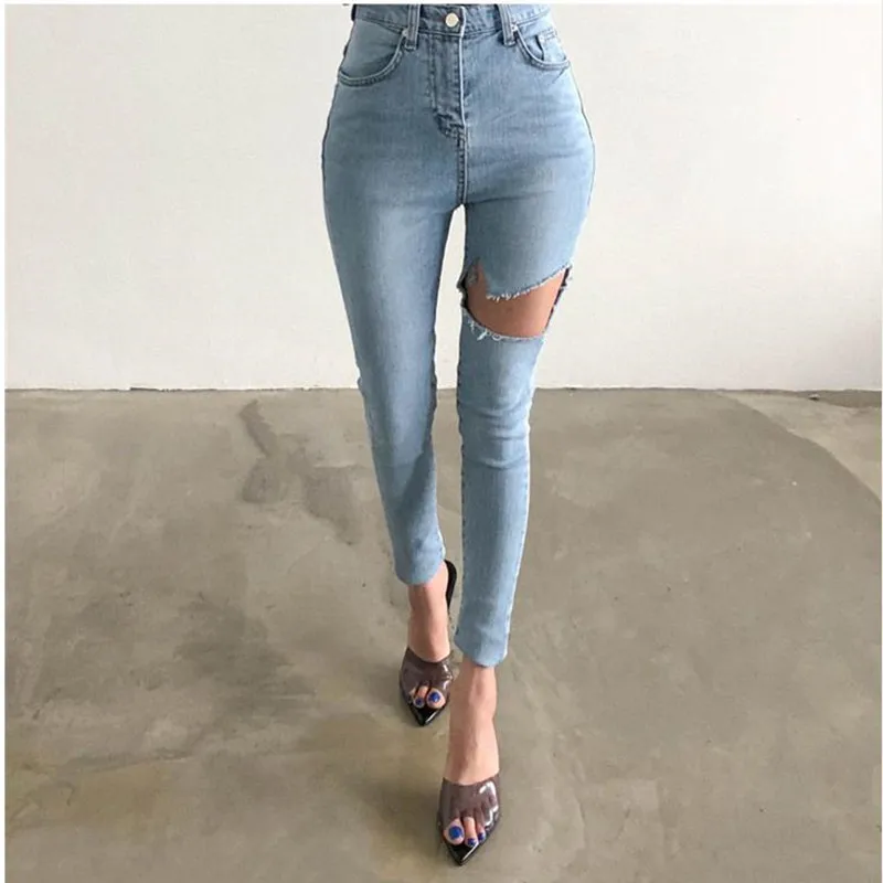 

The 2019 Korean version of the new 2 color ripped jeans high waist show thin tight height stretch small leg pants
