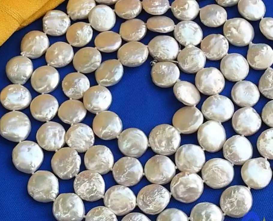 

FREE shipping>>>>>>Charming 10-11mm white coin freshwater pearl necklace 48