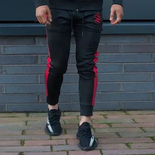 Calça casual Outono e inverno dos homens além do Preto vermelho listrado apertado calças Academias moda Trabalhar fora de fitness Calças Lápis