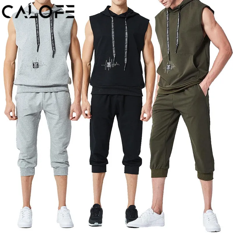 

2018 Men Sleeveless Loose Sport Yoga Set Hoodie Sweatshirt Drawstring Solid Fitness Tracksuit Male 2 Pcs Sportwear Run Jumpsuit