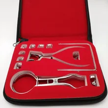 Free Shipping 2016 New 1set 12pcs Stainless Steel Dental Rubber Dam Kit Dental Surgical Instruments