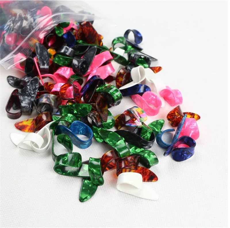 Guitar-accessories-celluloid-thumb-dial-Thumb-finger-right-hand-finger-Pick-guitar-thrum-pull (2)