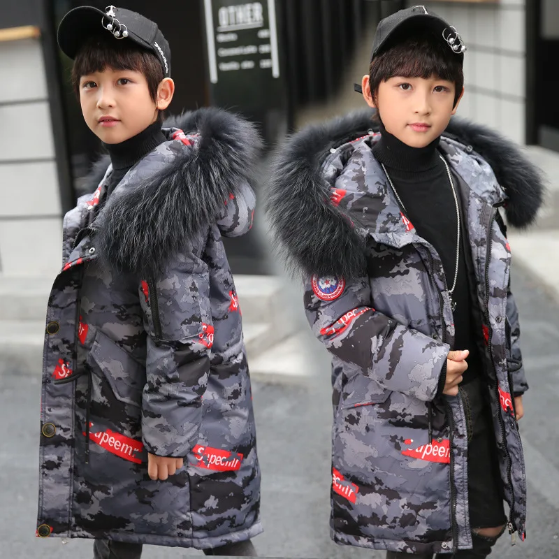 

Children down jacket in the boy's long 2018 new camouflage boy baby clothes coat season cuhk children upset