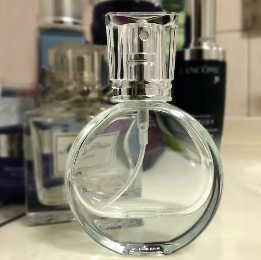 

Wholesale 100pcs/lot 20ml Glass Perfume Bottle Perfume Spray Bottle Clear Cosmetic Empty Bottles