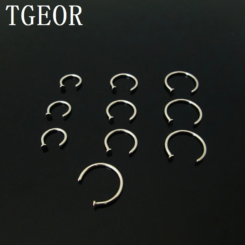 

Free shipping NEW HOT wholesale 100pcs COLORS nose stud Stainless Steel circular piercing nose ring