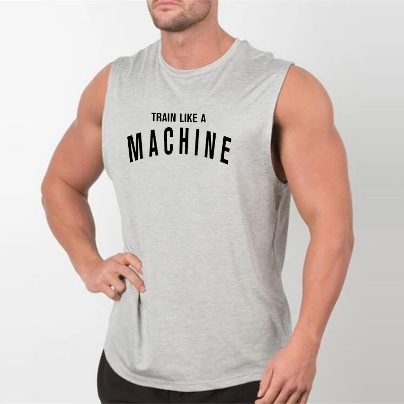 Train Like A Machine slogan on a gym tank top1