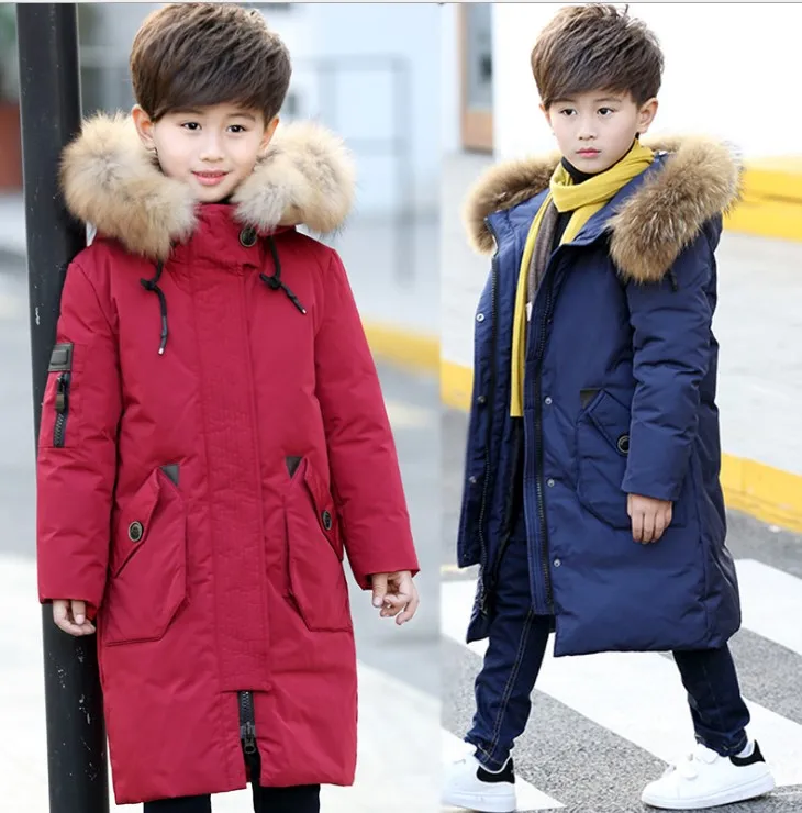 

Children's wear 2018 autumn and winter new children's down jacket boys in the long section thickening big children Korean versi