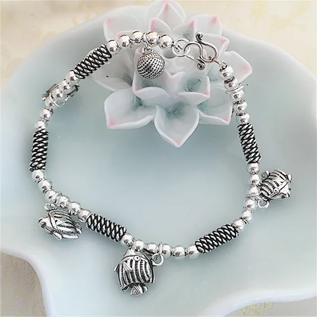 

925 Sterling Silver hemp rope lady bracelet with five pieces of fishes and one bell charm