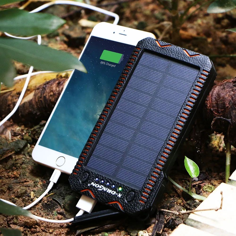 X-DRAGON Waterproof Solar Power Bank 15000 mAh Portable Solar Charger with Cigarette Lighter, SOS Strobe LED Lighting. X-DRAGON Waterproof Solar Power Bank 15000 mAh Portable Solar Charger with Cigarette Lighter, SOS Strobe LED Lighting.