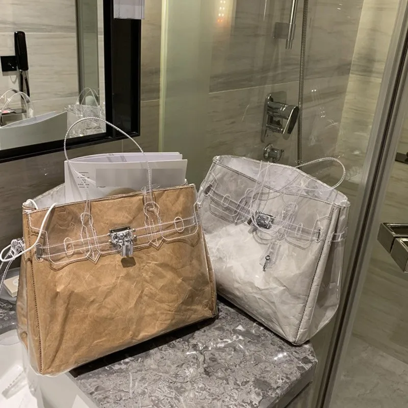 

2019 New White Color Large Transparent PVC Cap With Adjustable Strap Decoration Lock Messenger Bag Kraft Paper Bags OC720