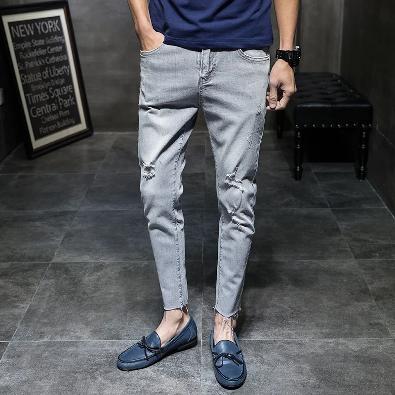 

2019 new Korean men's fashion hole jeans casual wild men's slim slimming nine points pants