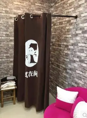 

A clothing store display rack. Iron art movable fitting room. A simple outdoor dressing room..