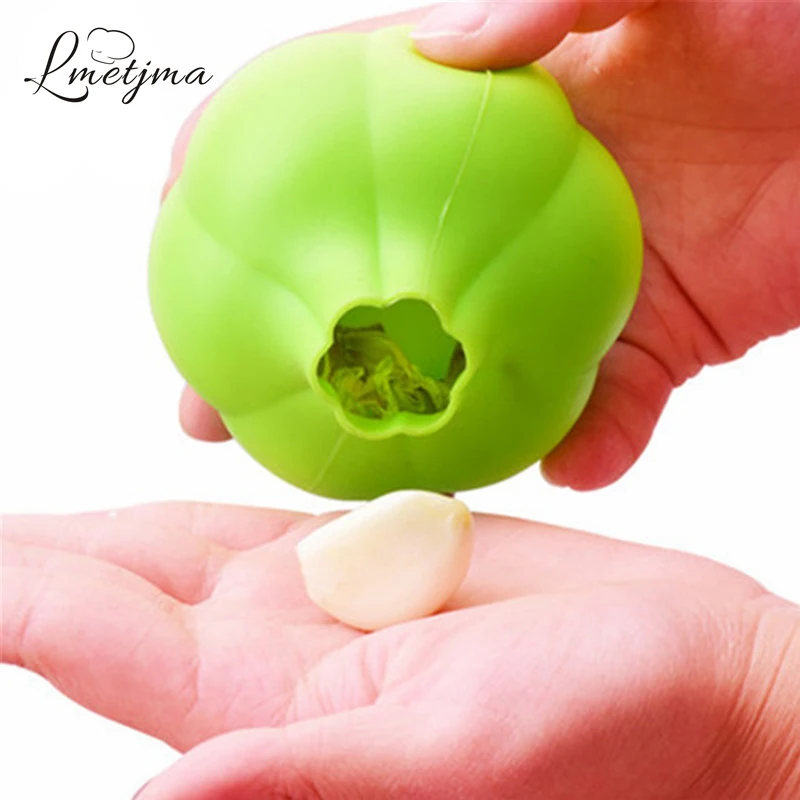 

LMETJMA Magic Silicone Garlic Peeler Peel Useful Garlic Peeler Machine Garlic Stripper Peeling Cooking Vegetable Gadgets D0013