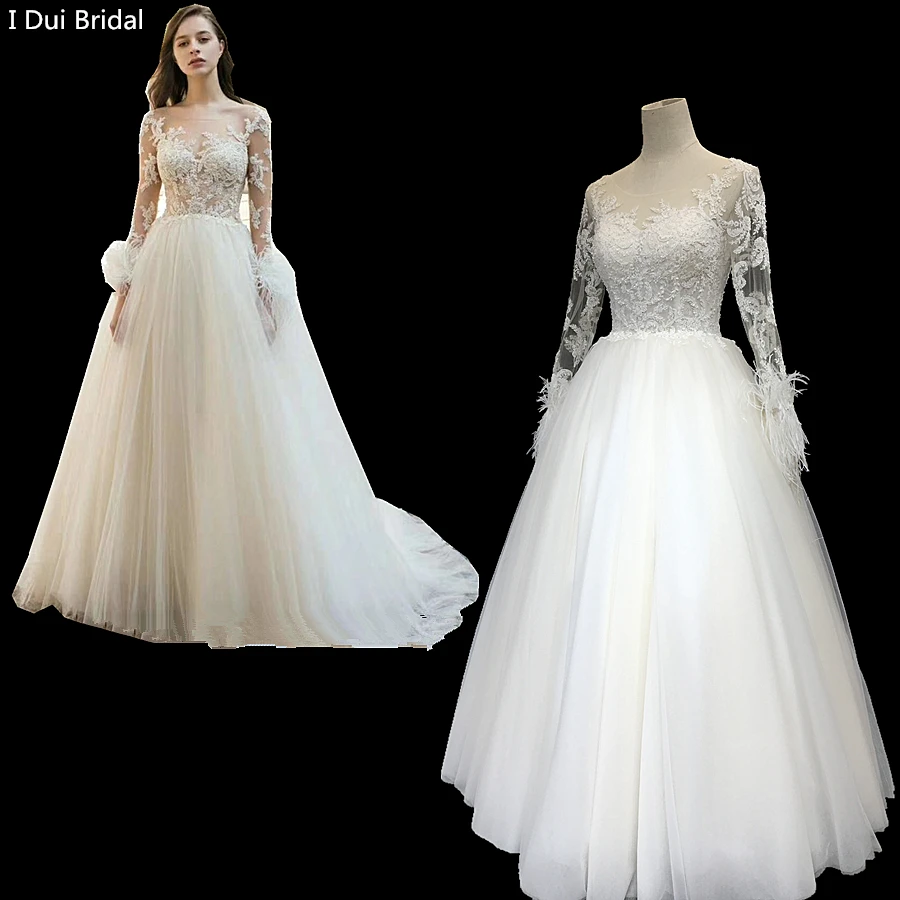 Buy Feather Wedding Dress Long Sleeve Lace Appliqued Beaded Bridal Gown from