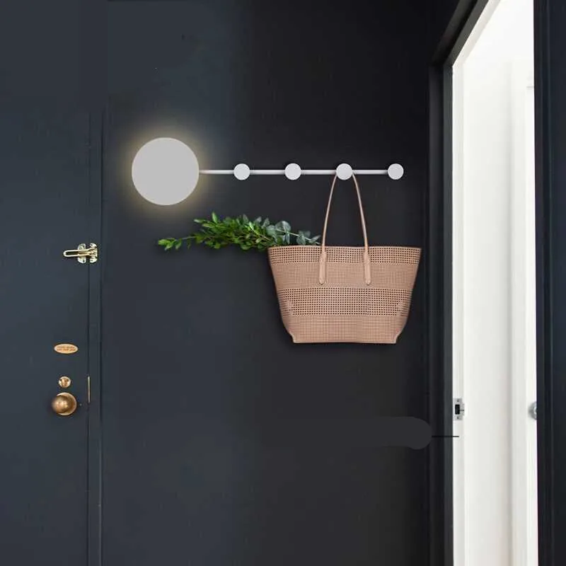 

Nordic post -modern minimalist wall lights creative bedroom clothing store hanging LED lamps Metal hanger wall lamps LU8221652