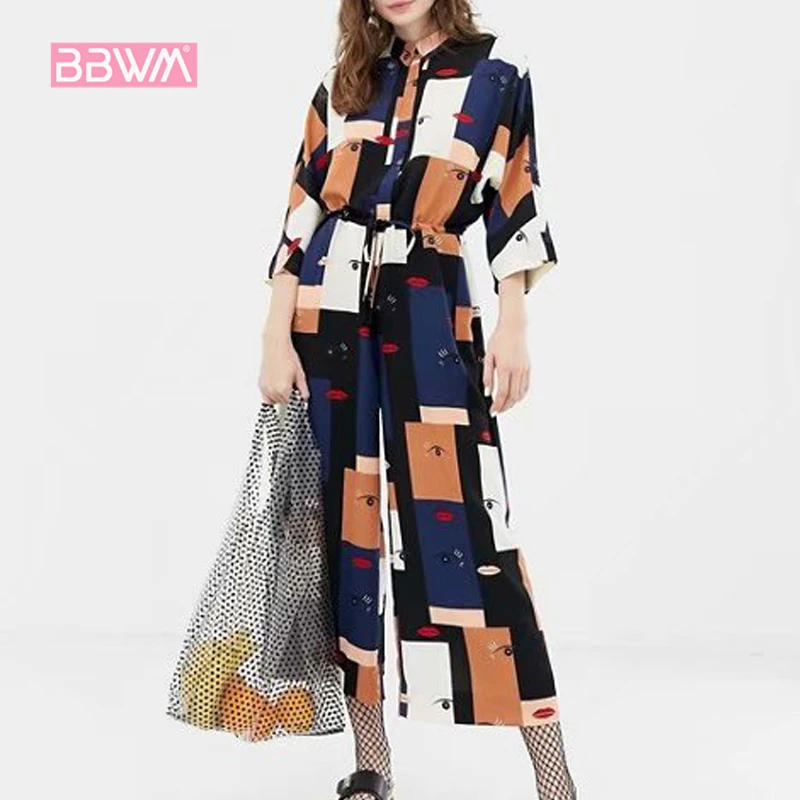 

2019 spring new checkered red lips eye print wide version jumpsuit Drawstring tie with wide leg trousers Lapel leisure vacation