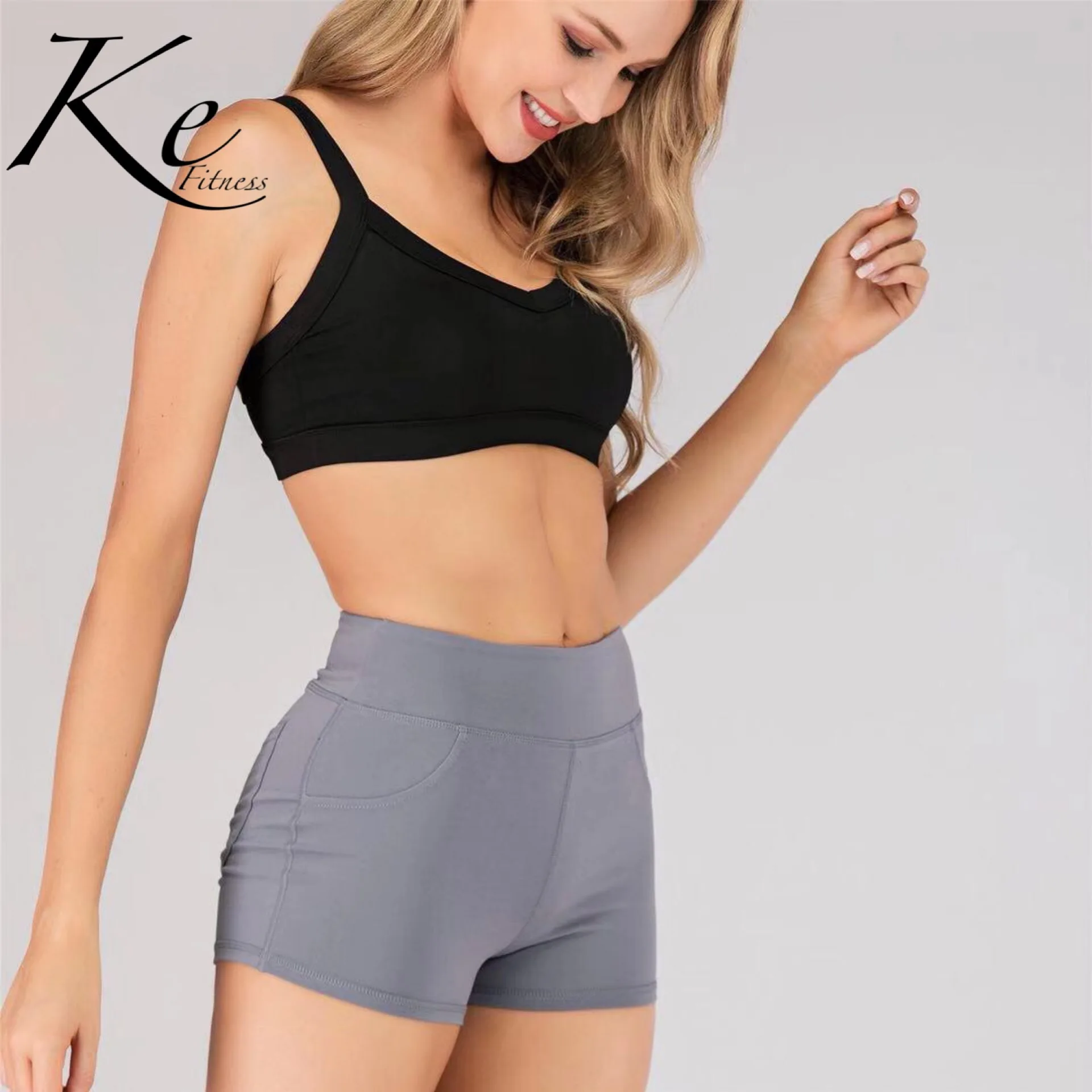 Ke honey peach hip shorts hip pocket fitness yoga shorts hot pants women tight elastic spinning bike hot pants