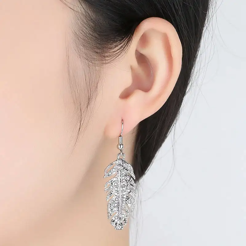 

Tassel Dangle Earrings For Women Leaf Hollow Metal Leaves Dangling Long Statement Drop Earrings Fashion Wedding Jewelry